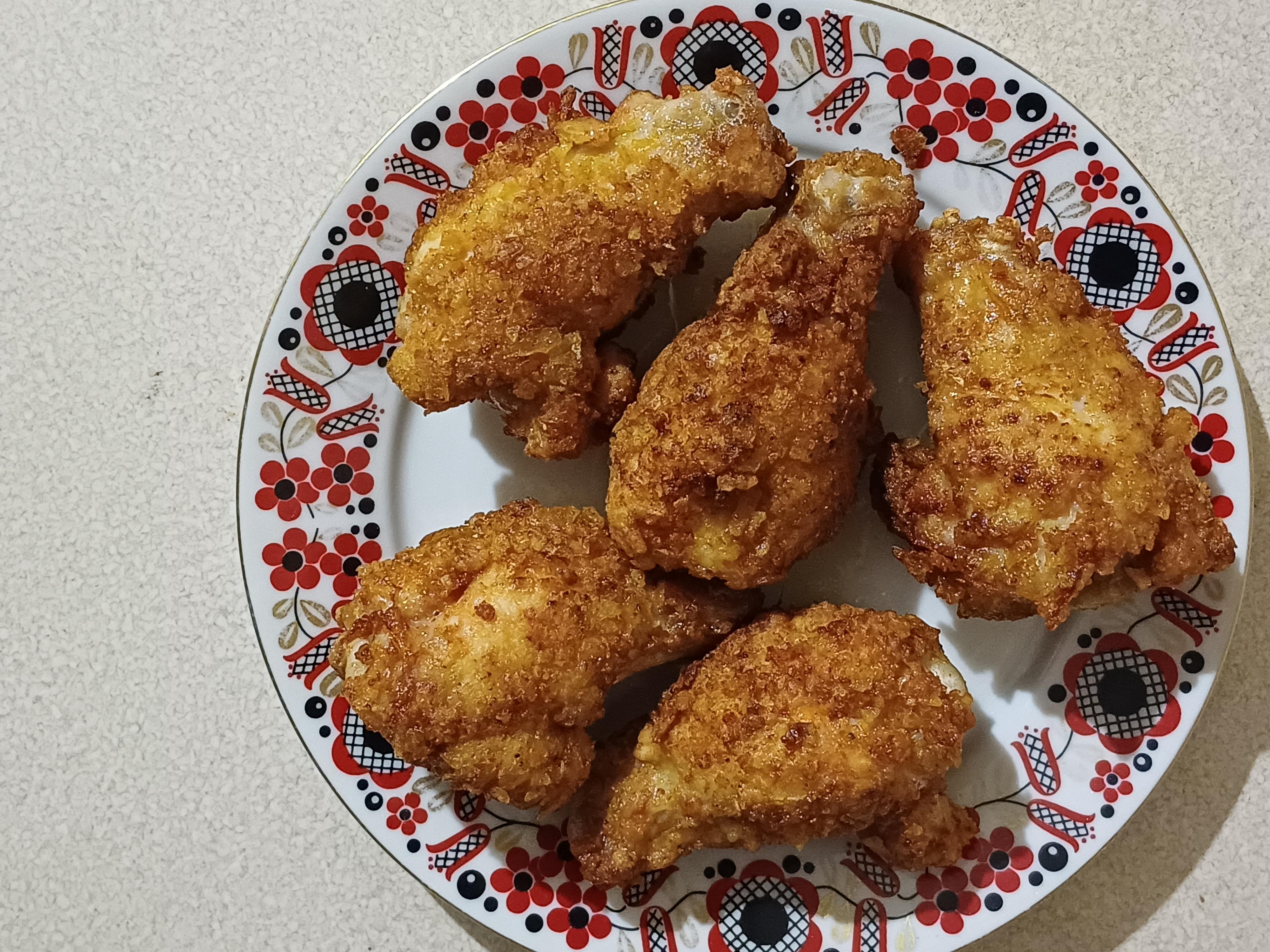 Курячі крильця в паніровці
