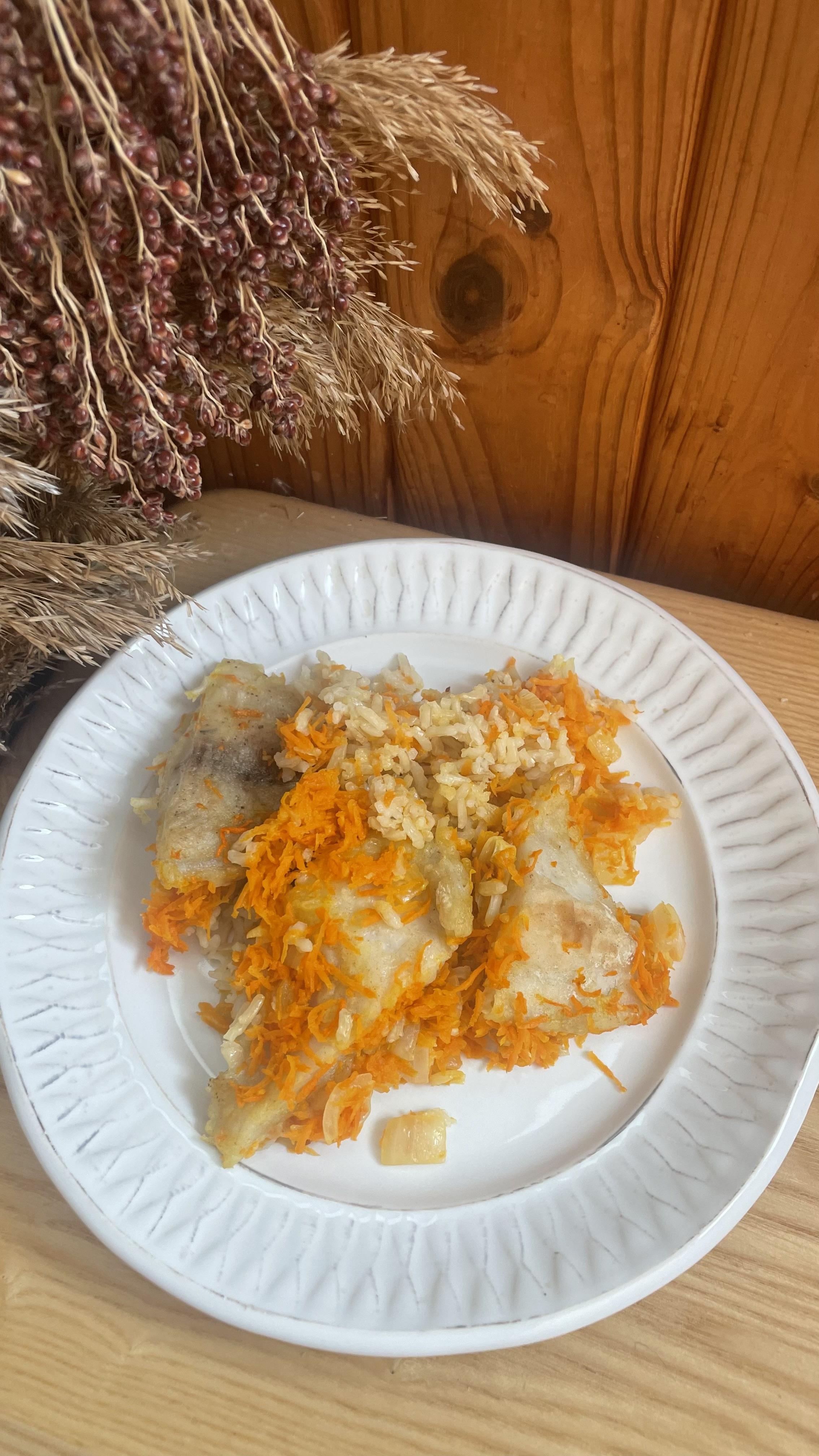 Тілапія з овочами та рисом