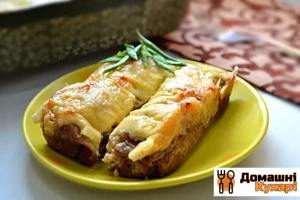 Млинці, запечені під сиром
