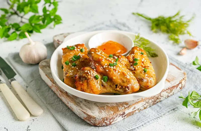 Chicken wings in soy sauce with garlic and honey