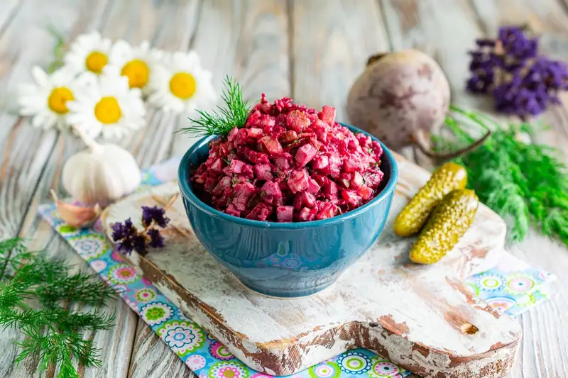 Salad with beets, eggs and pickled cucumbers